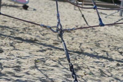 Close-up of chain on swing