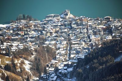 Zell am see and lake from above in winter sunny austria alps