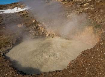 High angle view of water flowing over landscape