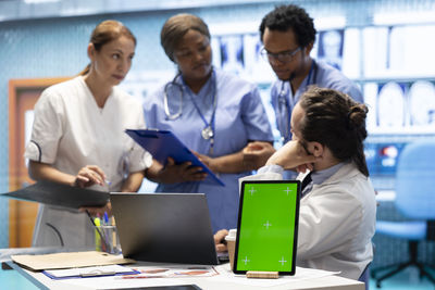 Business colleagues working at office