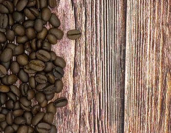 Directly above shot of coffee beans on wood