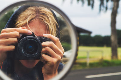 Portrait of man photographing