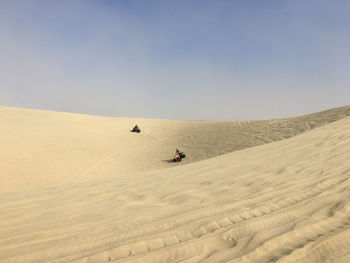 Scenic view of desert against sky