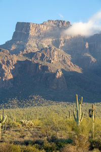 Scenic view of landscape and mountains against sky