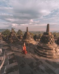 View of temple against building