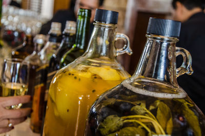 Close-up of drink in bottles on table