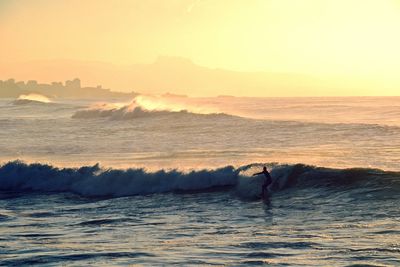 Scenic view of sea against sky during sunset