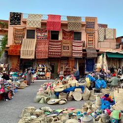 Street market against buildings in city