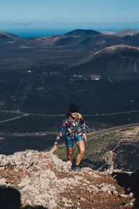 Woman looking at view of mountains