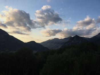 Scenic view of silhouette mountains against sky during sunset