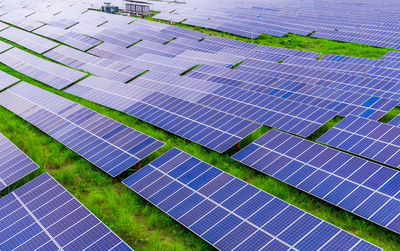 Rows of photovoltaic panels at a solar farm in nepal.