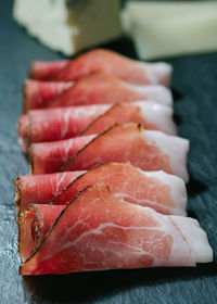 Close-up of meat on slate