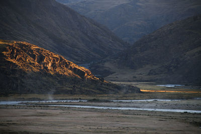 Scenic view of sea and mountains