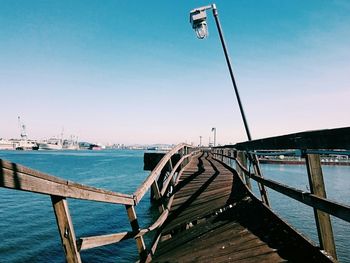 Pier over sea against sky