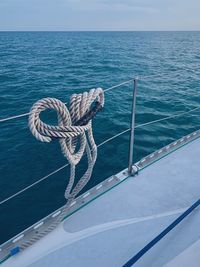 View of sailboat in sea against sky