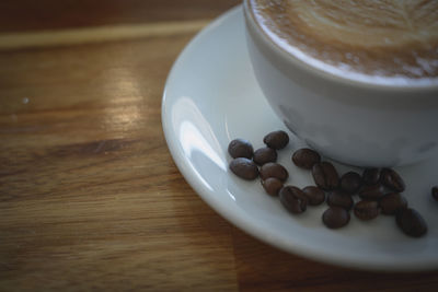 High angle view of coffee cup on table