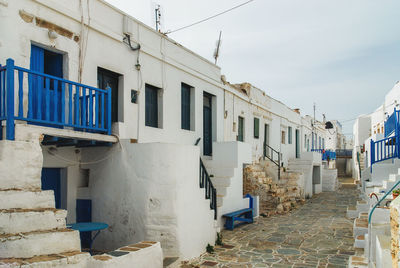 Residential buildings against blue sky