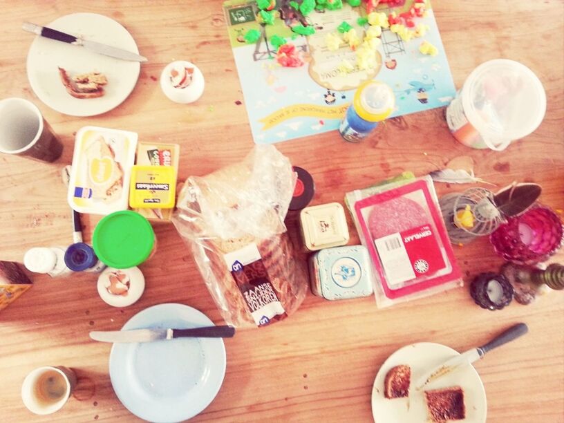 indoors, table, food and drink, still life, drink, wood - material, refreshment, high angle view, freshness, plate, drinking glass, coffee cup, fork, food, spoon, coffee - drink, wooden, table knife, cup, directly above