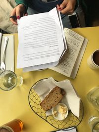 High angle view of man having food on table