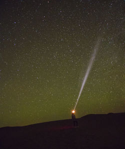 Scenic view of star field against sky at night