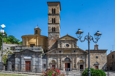 Low angle view of building against blue sky