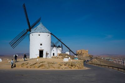 Traditional windmill against sky