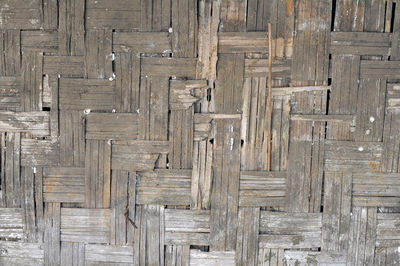Full frame shot of weathered old bamboo wall