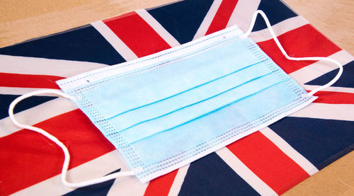 High angle view of paper flag on table