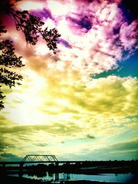 Scenic view of cloudy sky at sunset