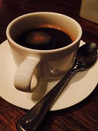 Close-up of coffee cup on table