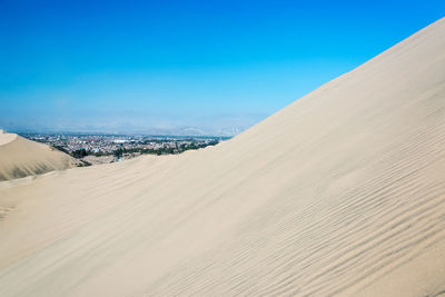 Scenic view of desert against sky