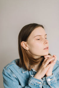 Portrait of a teenage girl looking away