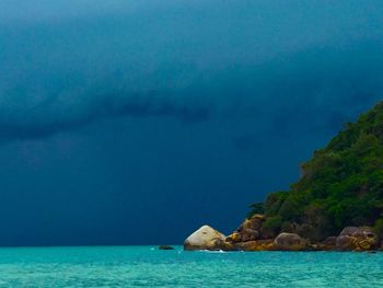 Scenic view of sea against blue sky