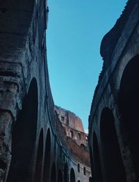 Low angle view of old ruins against clear sky