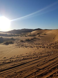 Scenic view of desert against sky