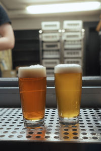 Close-up of beer glass on table