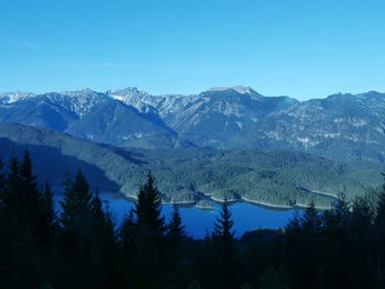 High angle view of calm lake against mountain range