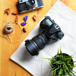 High angle view of camera on table