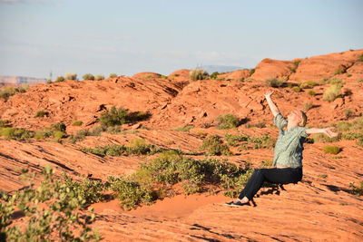 Man standing on rock