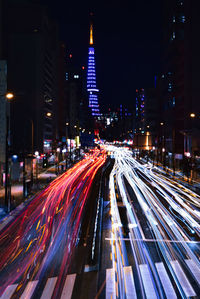 High angle view of light trails on road at night