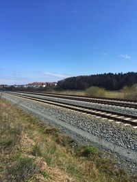 Railroad tracks against sky