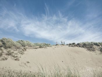 Scenic view of desert against sky