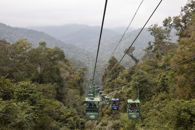 Overhead cable cars over mountains