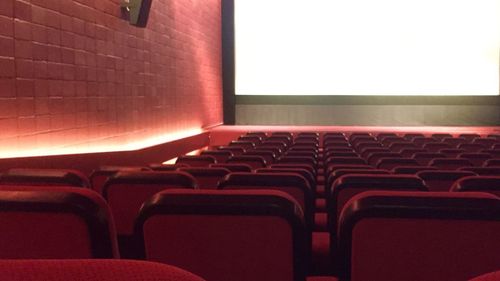 Close-up of empty seats in room