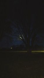 Scenic view of field against sky at night