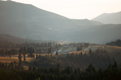 Scenic view of mountains against sky during sunset