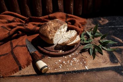 High angle view of bread on cutting board