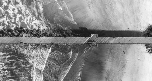 High angle view of dam by sea