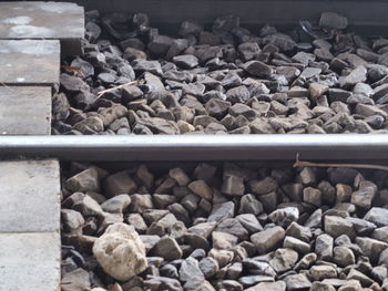 Close-up of stones on railroad track