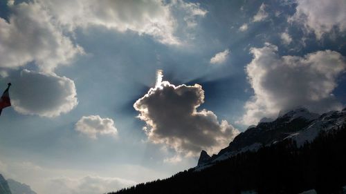 Low angle view of silhouette mountain against sky